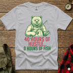 White t-shirt with graphic of a bear fishing and text: "40 Hours of Hustle... 0 Hours of Fish"