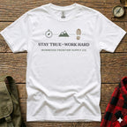 White t-shirt with "Stay True. Work Hard." graphic and compass, mountain, footprint icons.