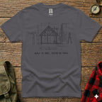 T-shirt graphic of a blueprint for a log cabin with dimensions and "Built to Spec, Tested by Trail."