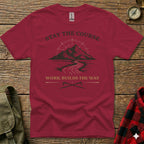 Maroon t-shirt with "Stay the Course" and mountain path graphic.