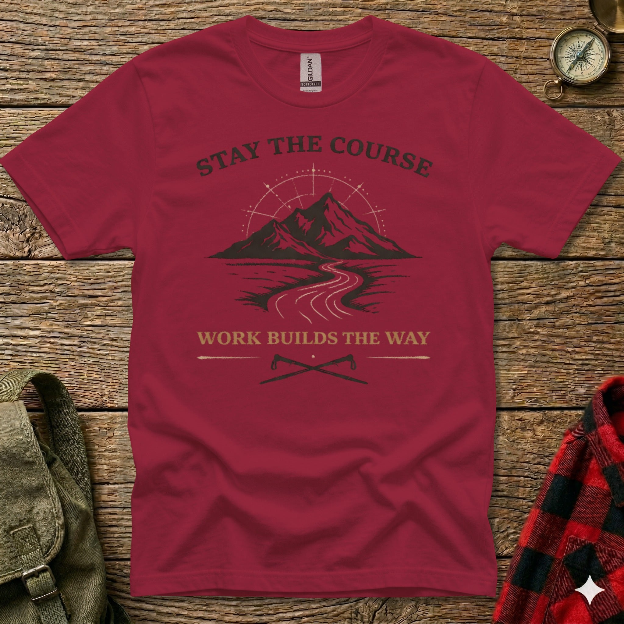 Maroon t-shirt with "Stay the Course" and mountain path graphic.