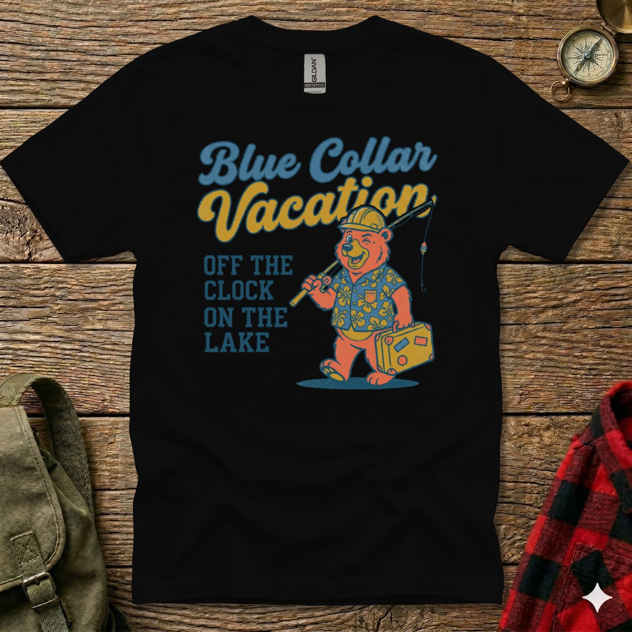 Black t-shirt with cartoon bear fishing on a lake vacation.