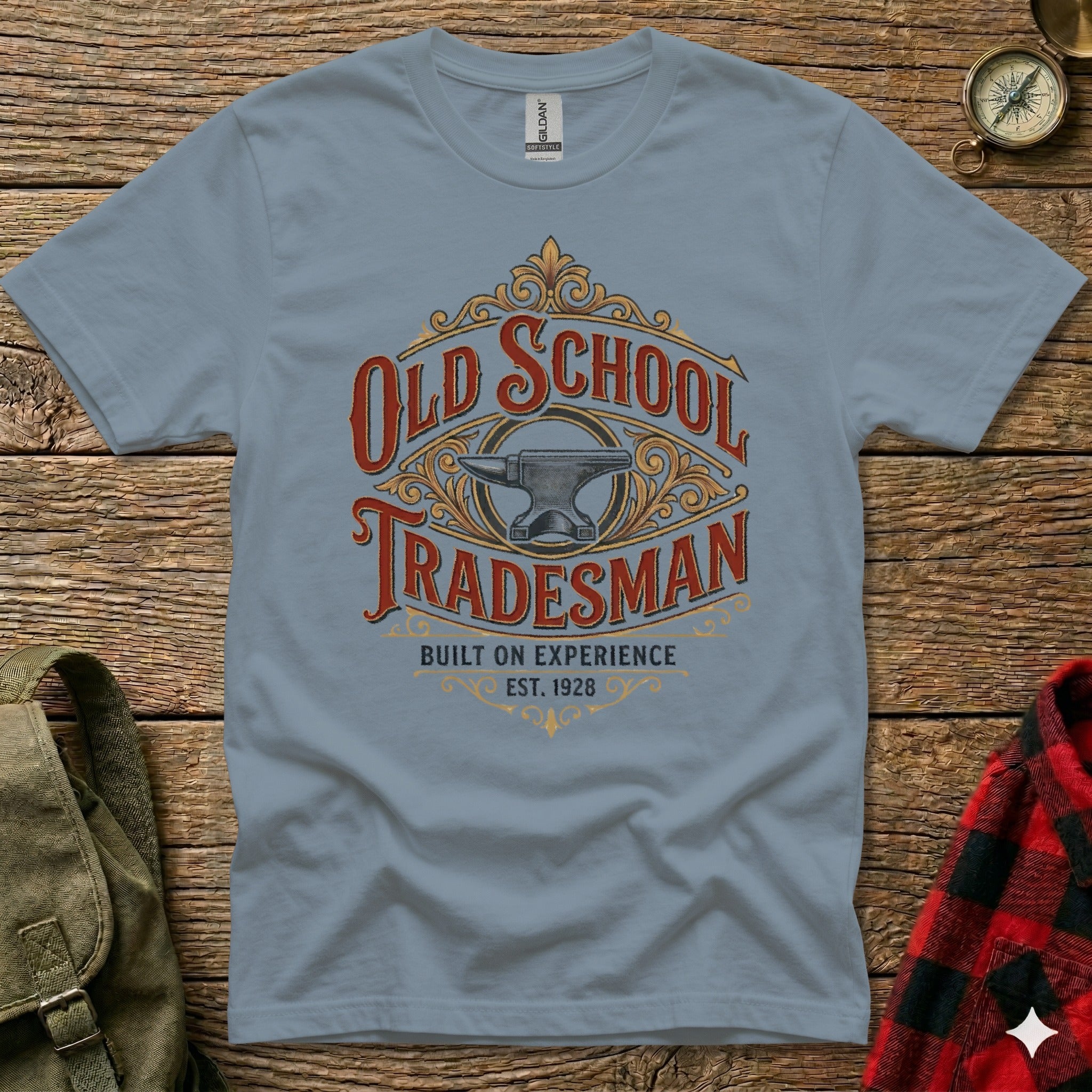 Gray t-shirt with "Old School Tradesman Built on Experience Est. 1928" and an anvil graphic.