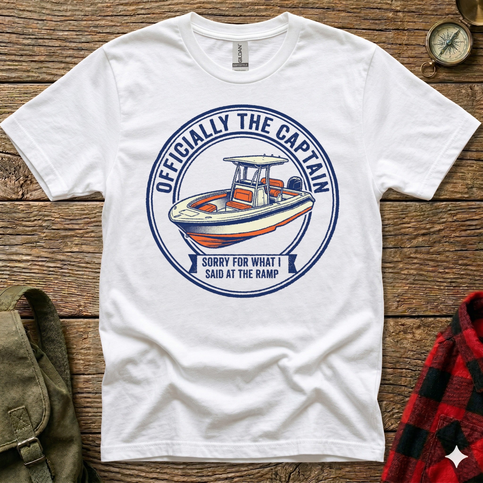 White t-shirt with blue circle graphic reading "Officially the Captain" and "Sorry for what I said at the ramp".