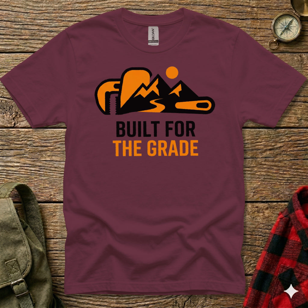 Maroon t-shirt with orange mountain graphic and "BUILT FOR THE GRADE" text.