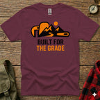 Maroon t-shirt with orange mountain graphic and "BUILT FOR THE GRADE" text.