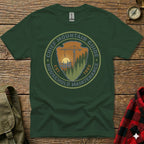 Green t-shirt with "Chief Mountain Guide Household Maintenance" logo.