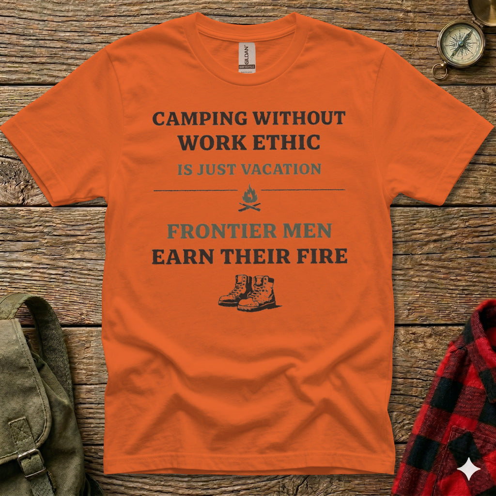 Orange t-shirt with "Camping Without Work Ethic Frontier Men Earn Their Fire" text and hiking boots graphic.