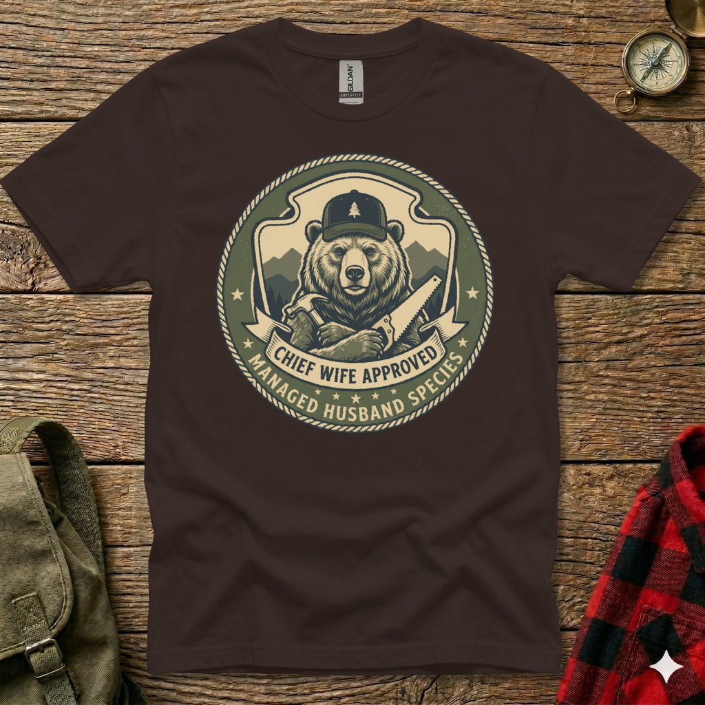 Brown t-shirt with bear holding a saw, text "Chief Wife Approved Husband Species".