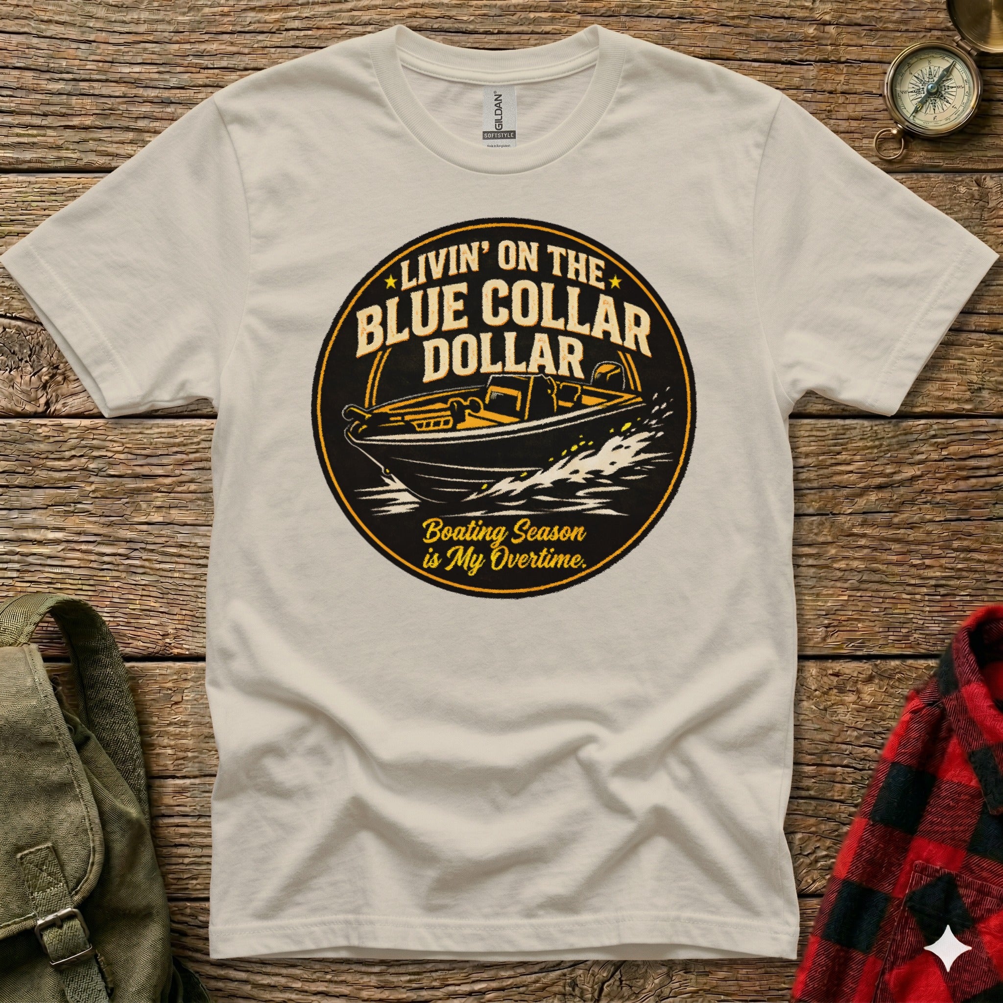 T-shirt graphic with yellow text "Livin' on the Blue Collar Dollar" and a boat.