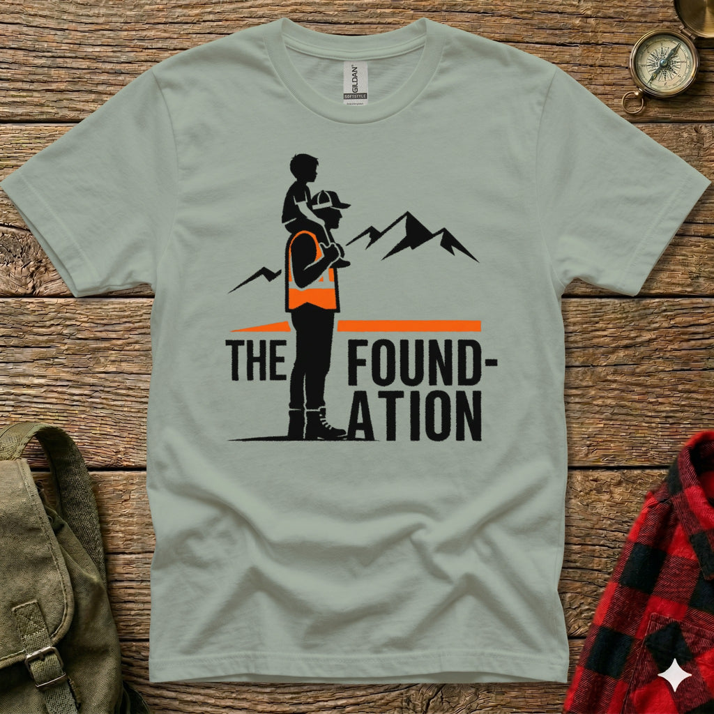 Gray t-shirt with "THE FOUNDATION" text and mountain graphic.