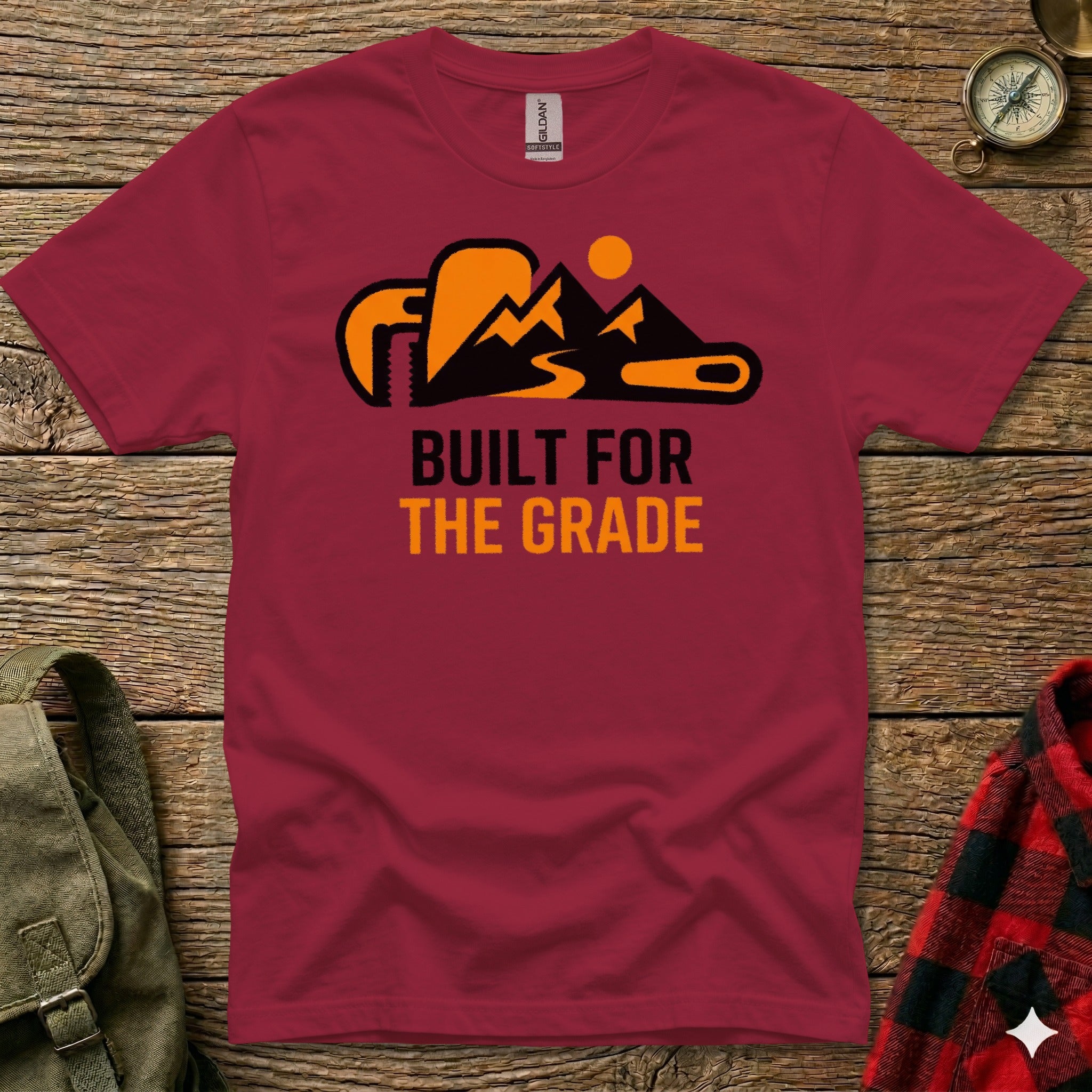 Burgundy t-shirt with "BUILT FOR THE GRADE" text and mountain graphic.