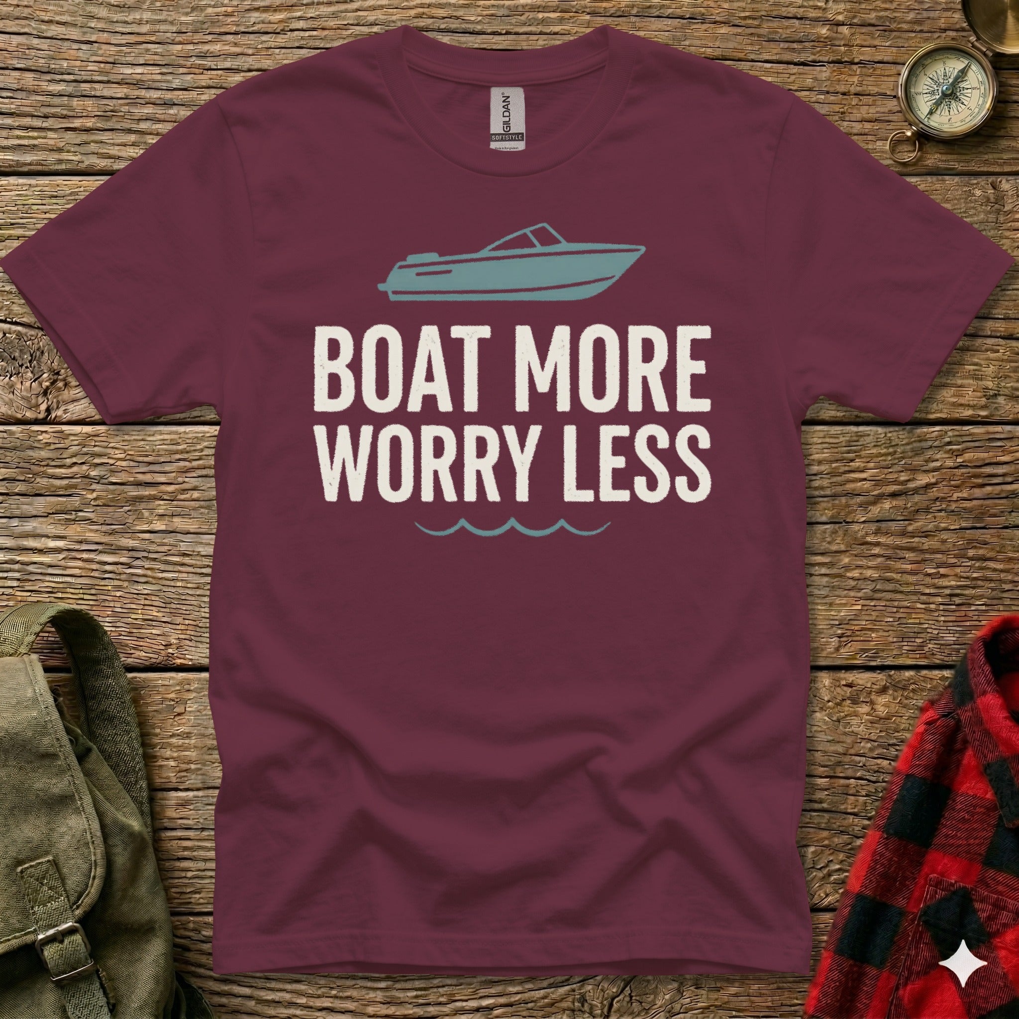 Maroon t-shirt with "BOAT MORE WORRY LESS" and waves graphic.