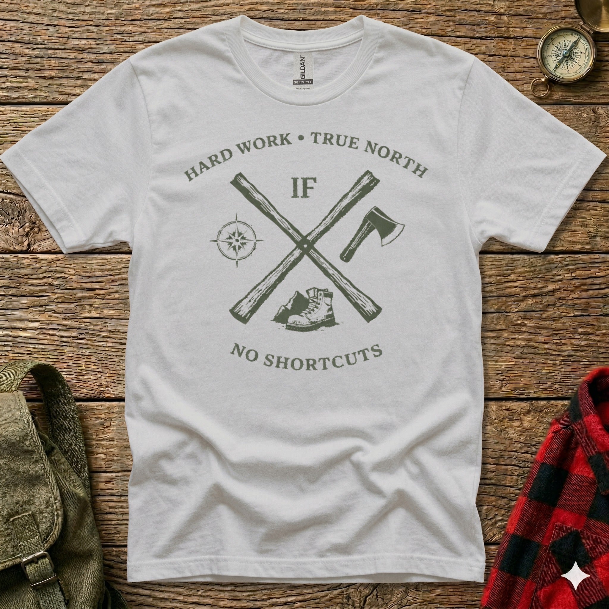 White t-shirt with "Hard Work True North" and crossed axe and shovel graphic.