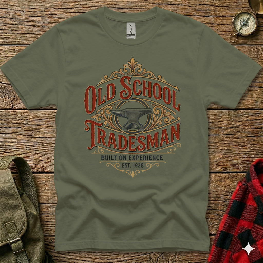 Olive green t-shirt with "Old School Tradesman Built On Experience Est. 1928" text and anvil graphic.