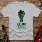 White t-shirt with green wrench graphic and text "BUILT FOR THE GRADE".