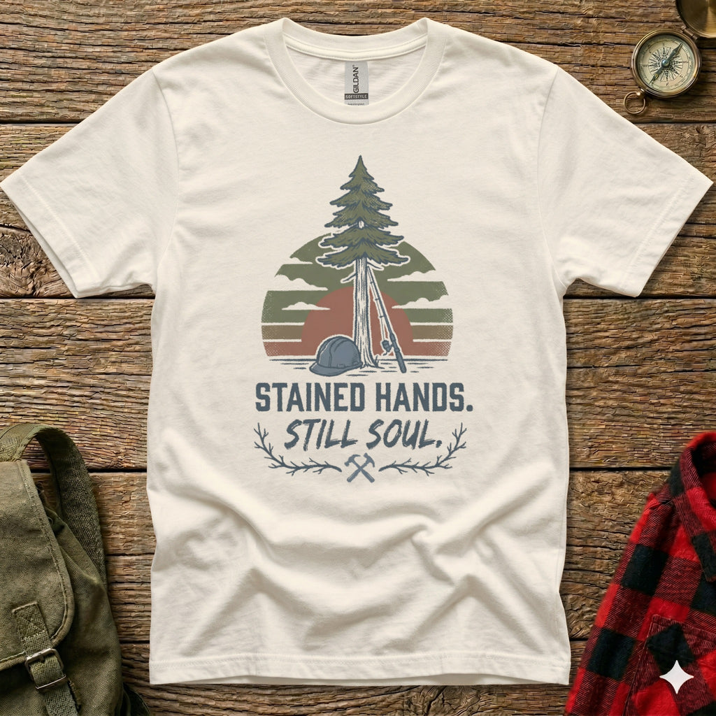 White t-shirt with forest and text "STAINED HANDS. STILL SOUL."