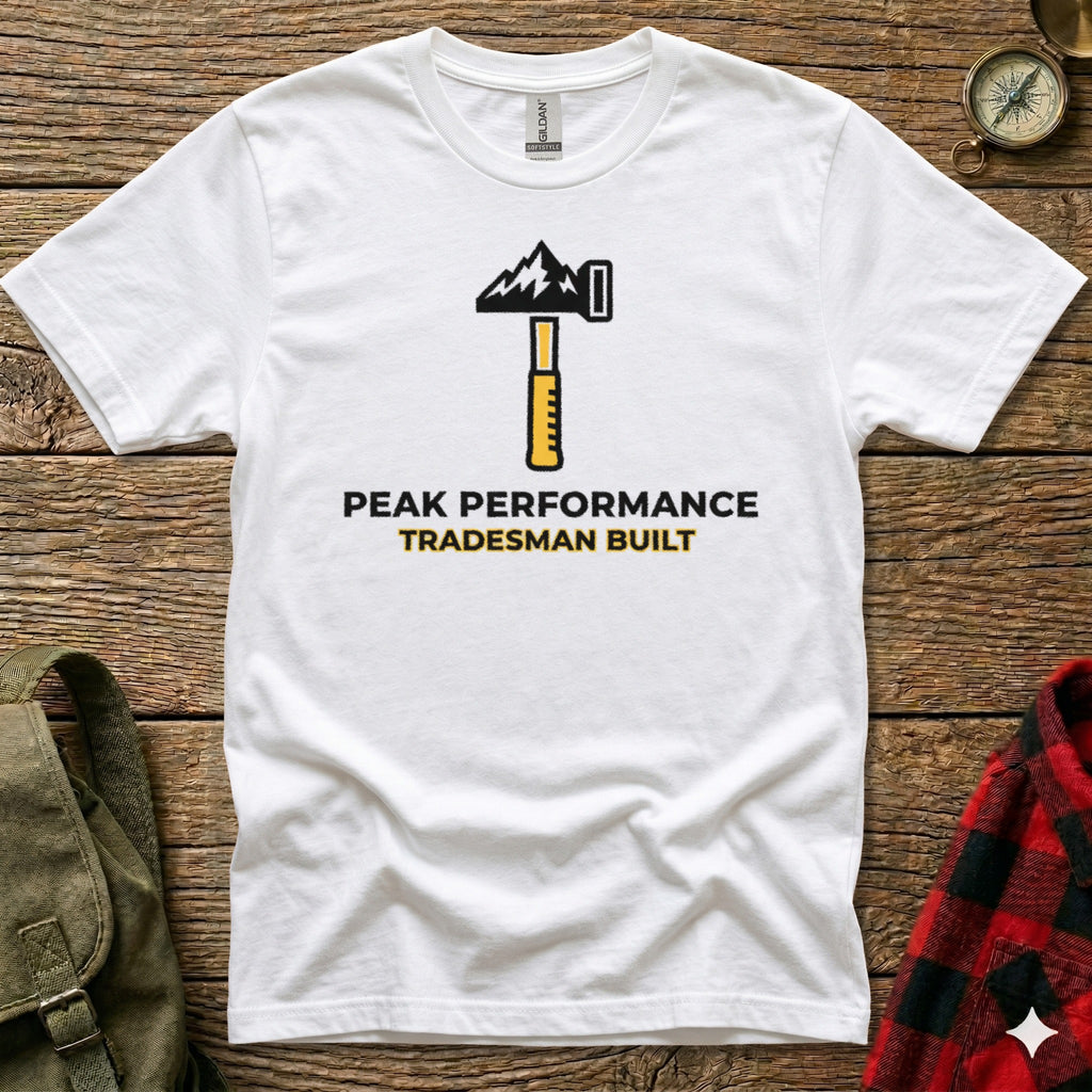 White t-shirt with "Peak Performance Tradesmen Built" logo featuring a hammer and mountain.