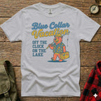 White t-shirt with "Blue Collar Vacation" and bear fishing on a lake.