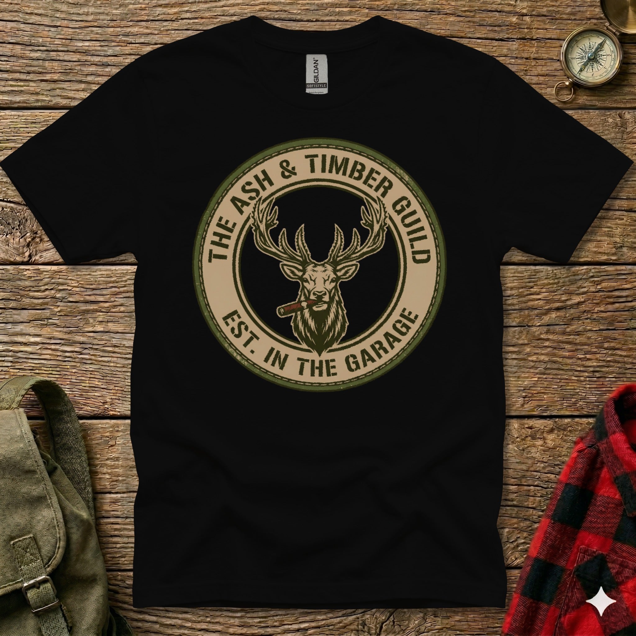 Black t-shirt with a circular logo featuring a deer smoking a cigar.