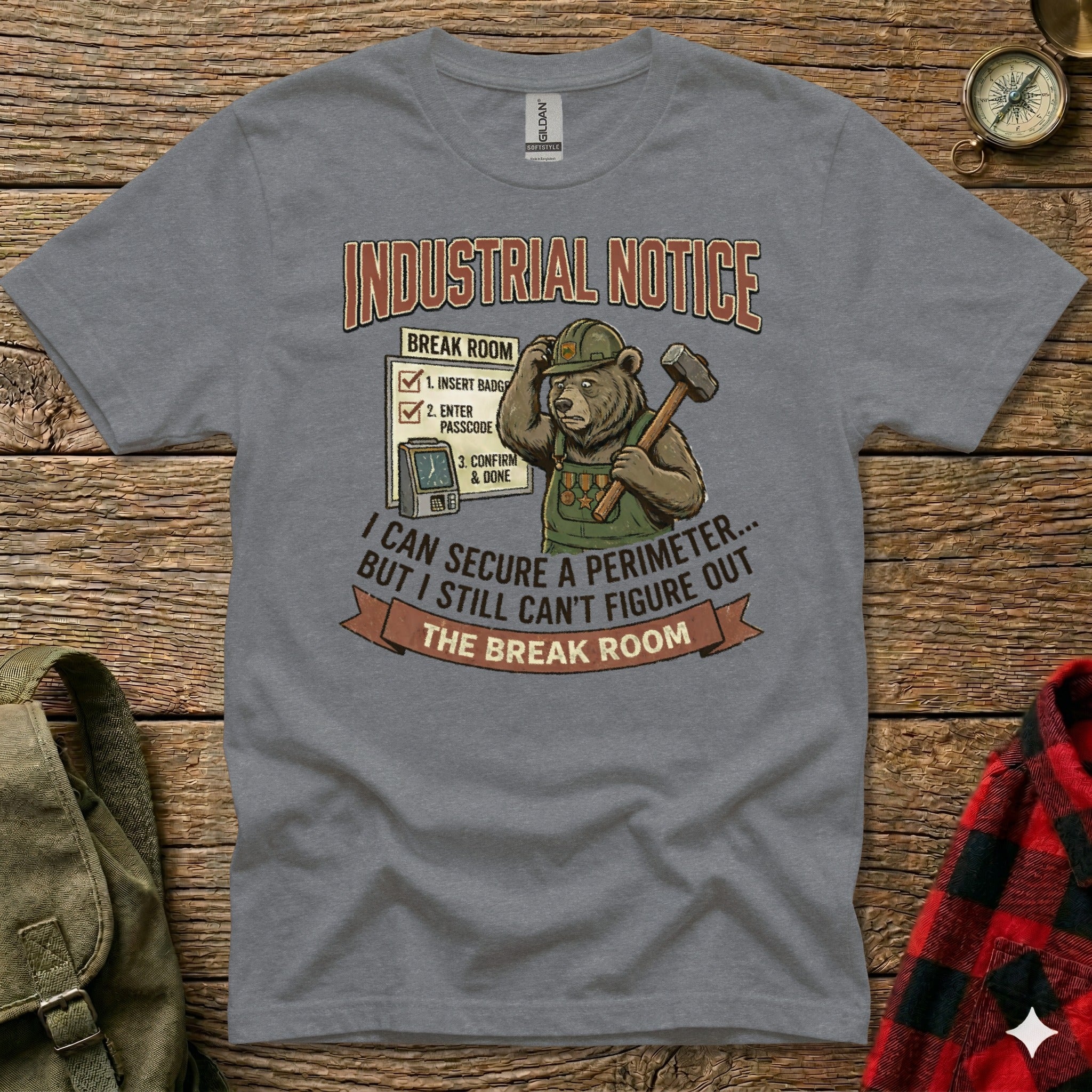 T-shirt with illustration of bear in hard hat, industrial notice about break room entry.