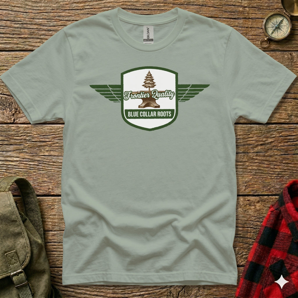Green t-shirt with "Frontier Quality Blue Collar Roots" logo featuring wings and anvil.