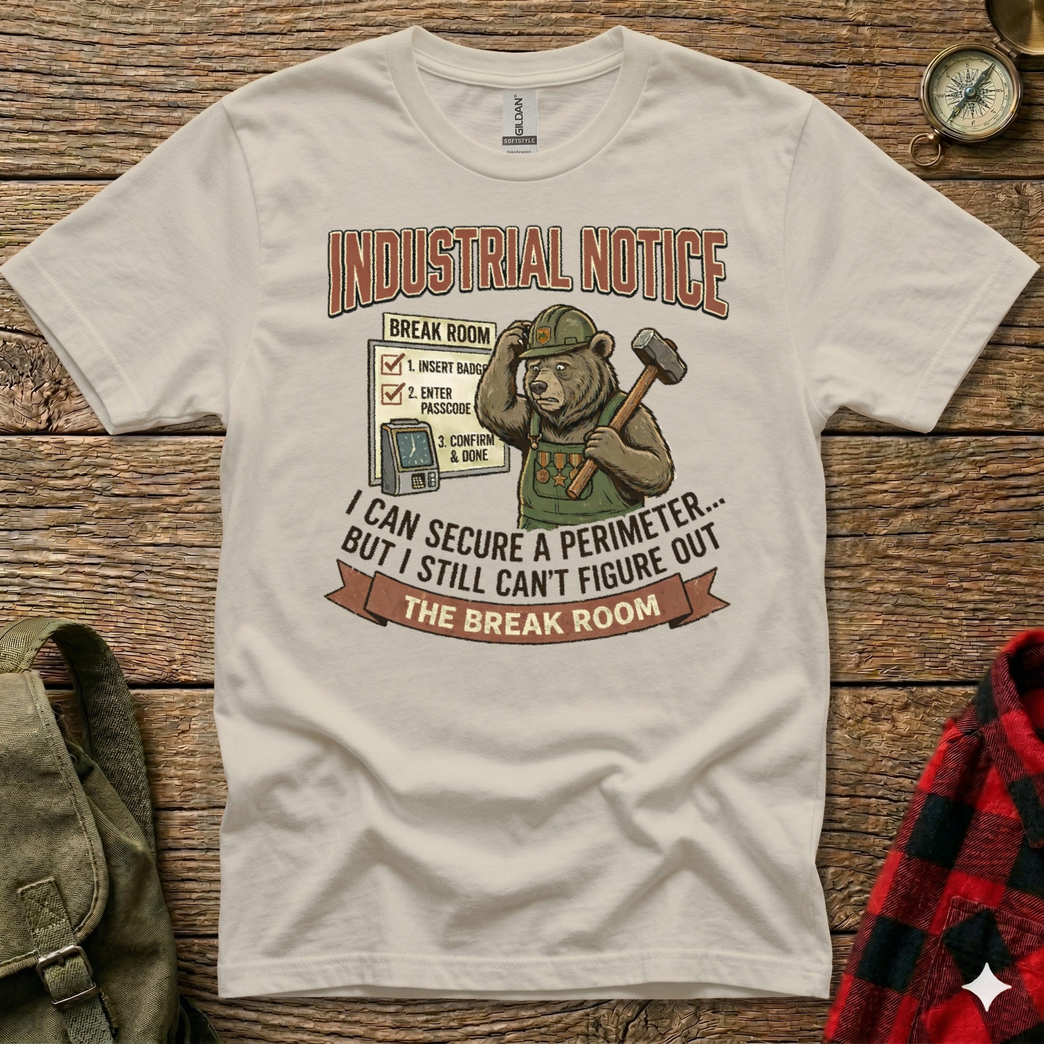 T-shirt with cartoon bear in hard hat holding hammer, wearing "Industrial Notice" sign.