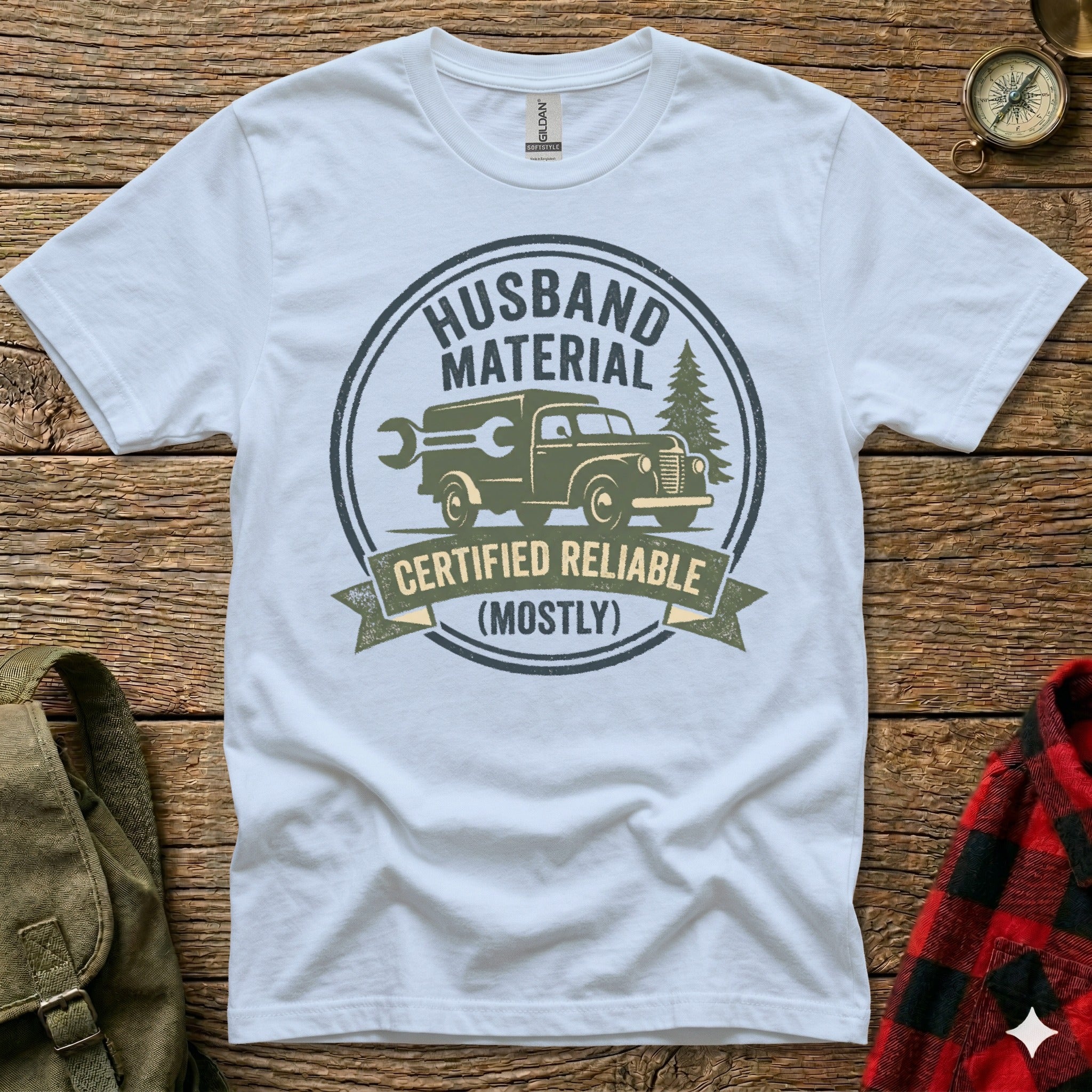 White t-shirt with "Husband Material Certified Reliable (Mostly)" graphic.