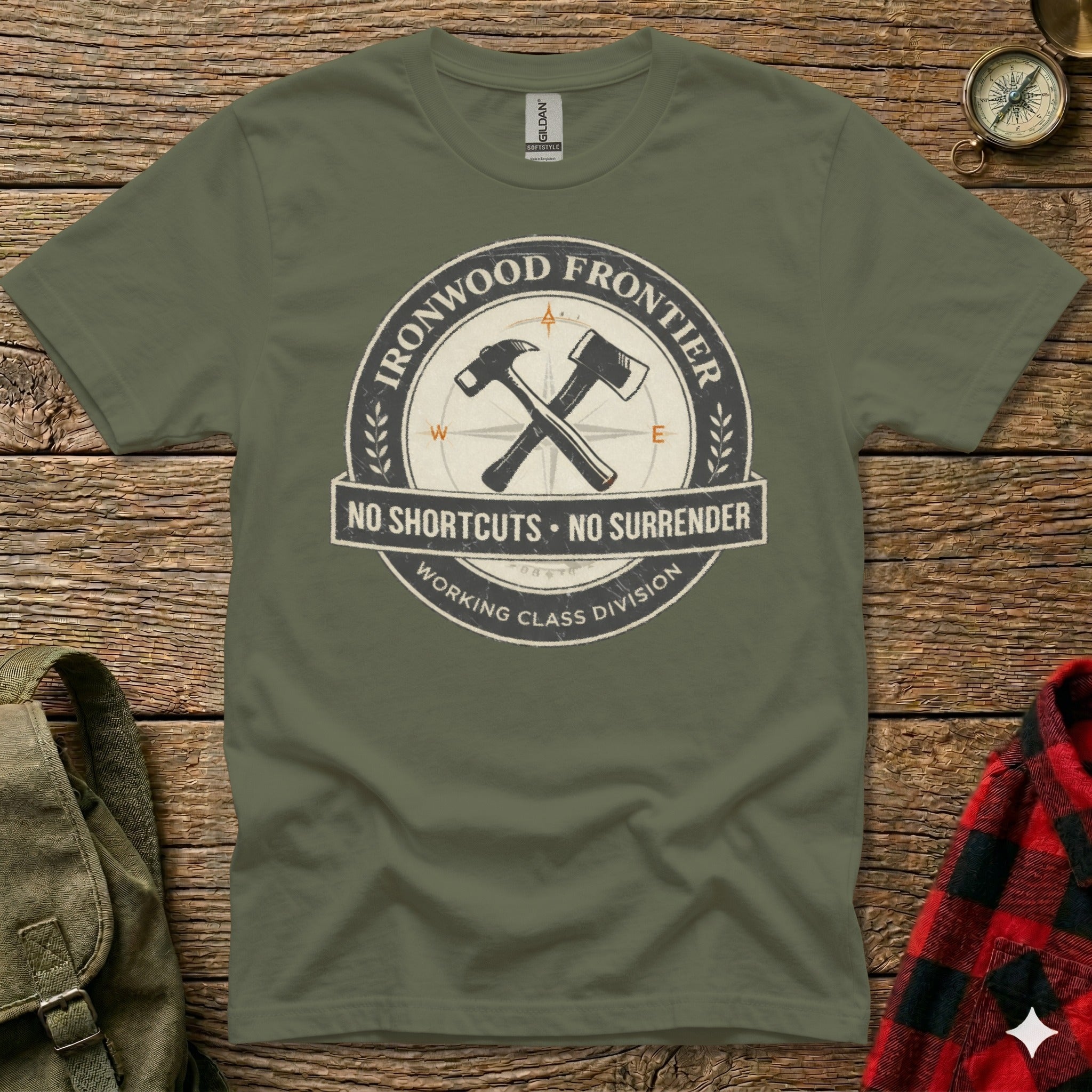 Green t-shirt with "Ironwood Frontier No Shortcuts. No Surrender Working Class Division" graphic.