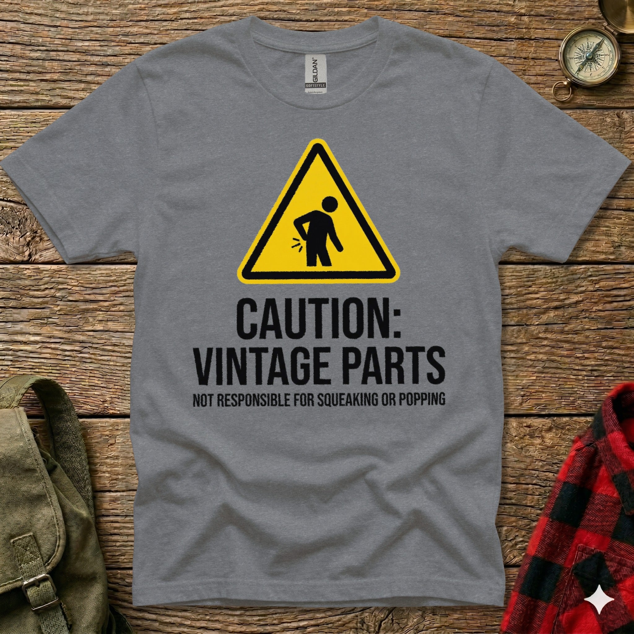 Grey t-shirt with "Caution: Vintage Parts, Not Responsible for Squeaking or Popping" text.