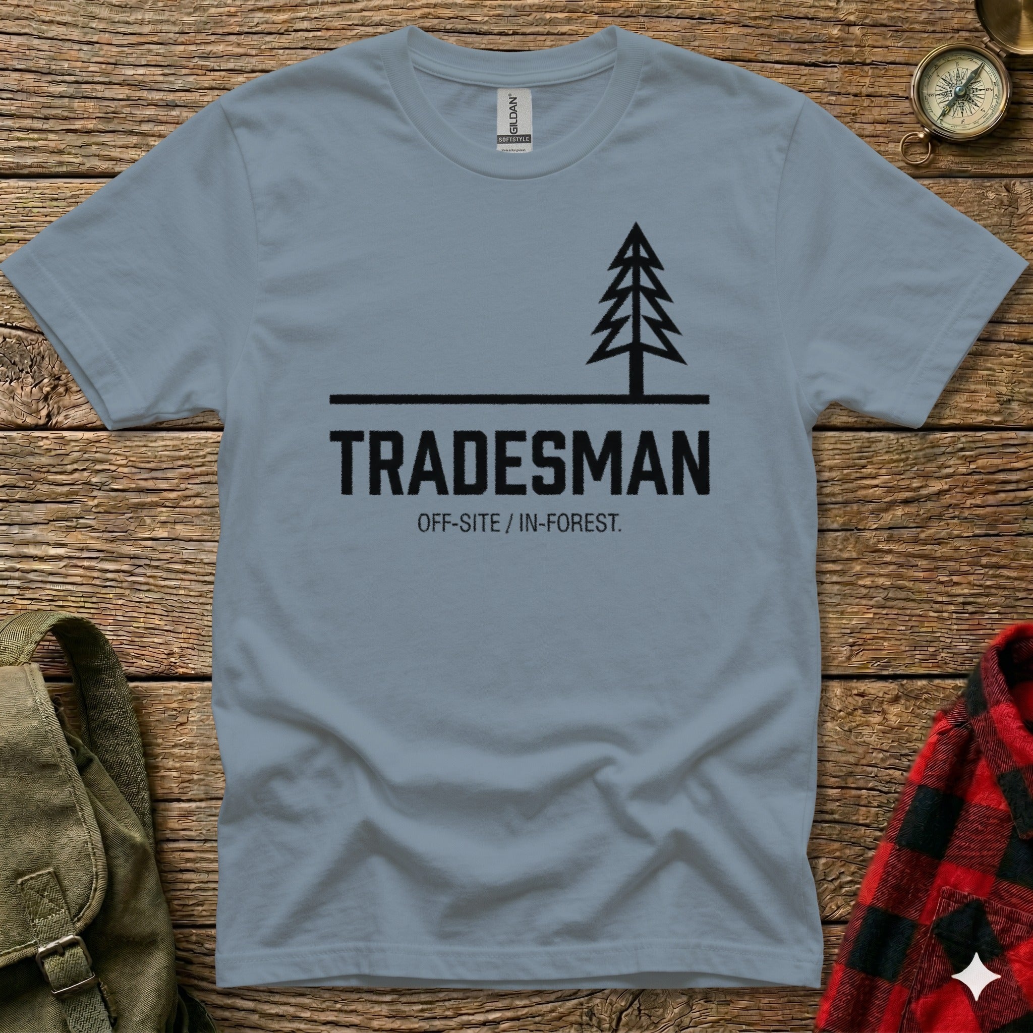 Gray t-shirt with "TRADESMAN OFF-SITE / IN-FOREST." text and a stylized pine tree graphic.